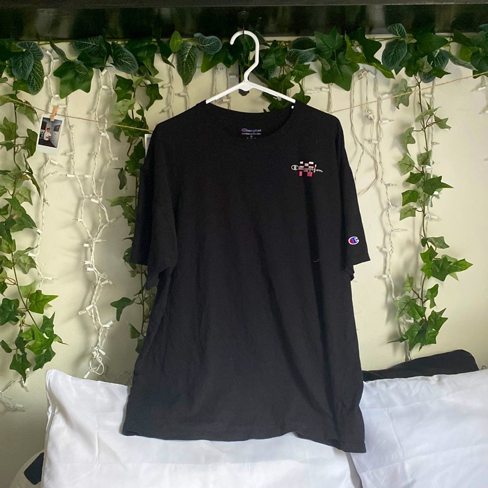 I am selling a champion T-shirt in good condition and has really been used
